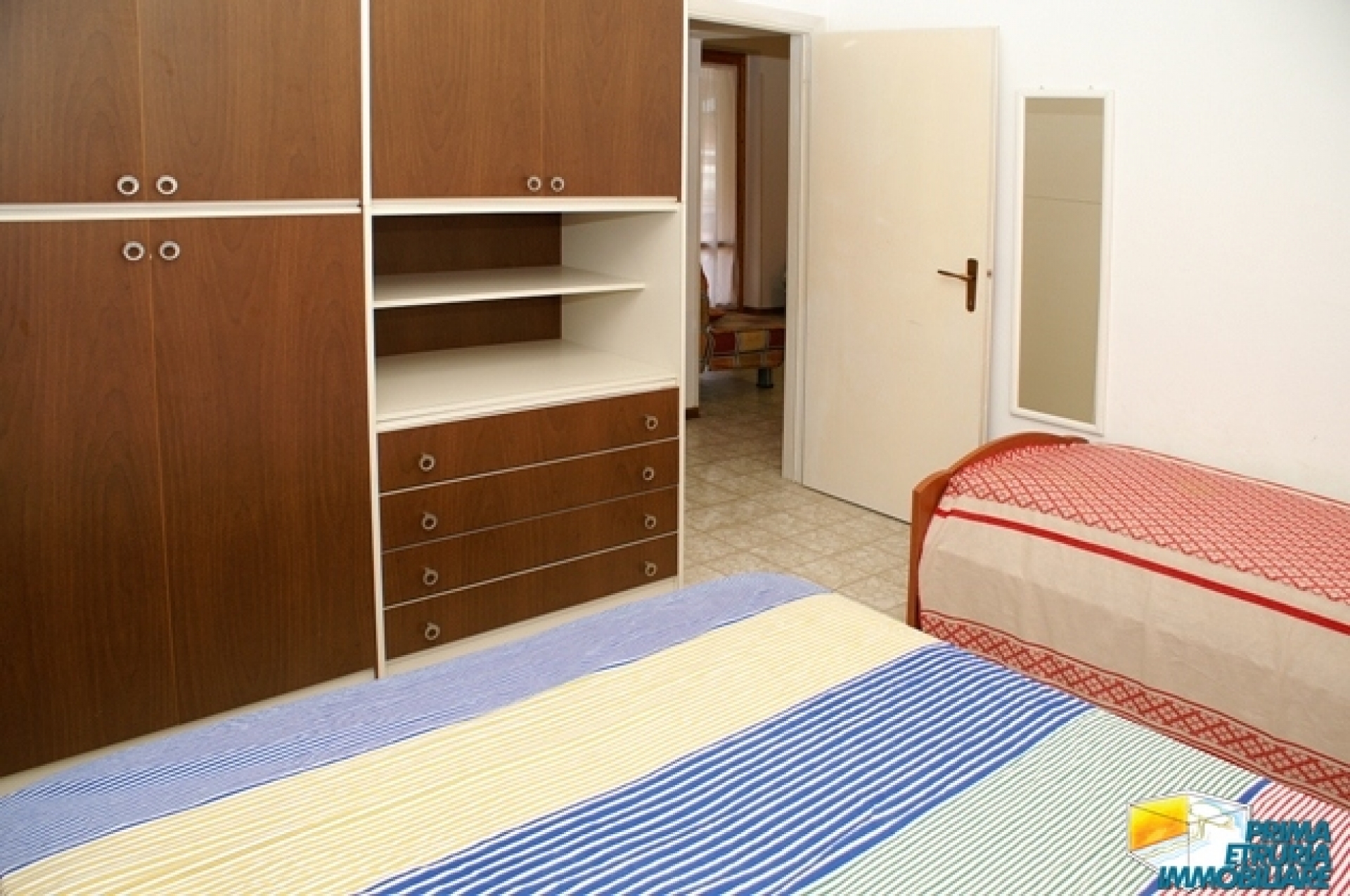 BILOCALE CON AMPIO GIARDINO IN VIA CALA DI FORNO - ZONA ROSMARINA - 