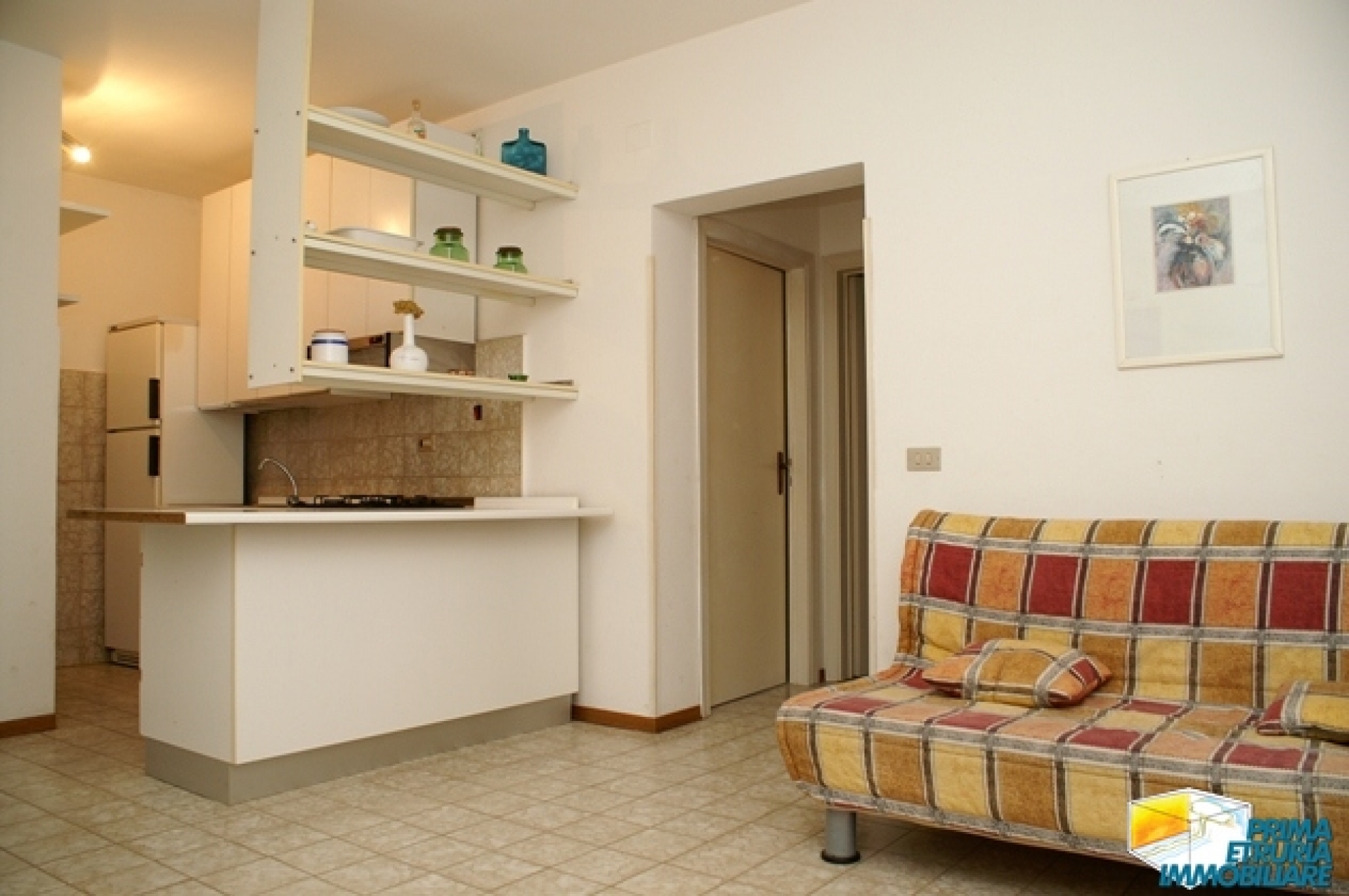 BILOCALE CON AMPIO GIARDINO IN VIA CALA DI FORNO - ZONA ROSMARINA - 