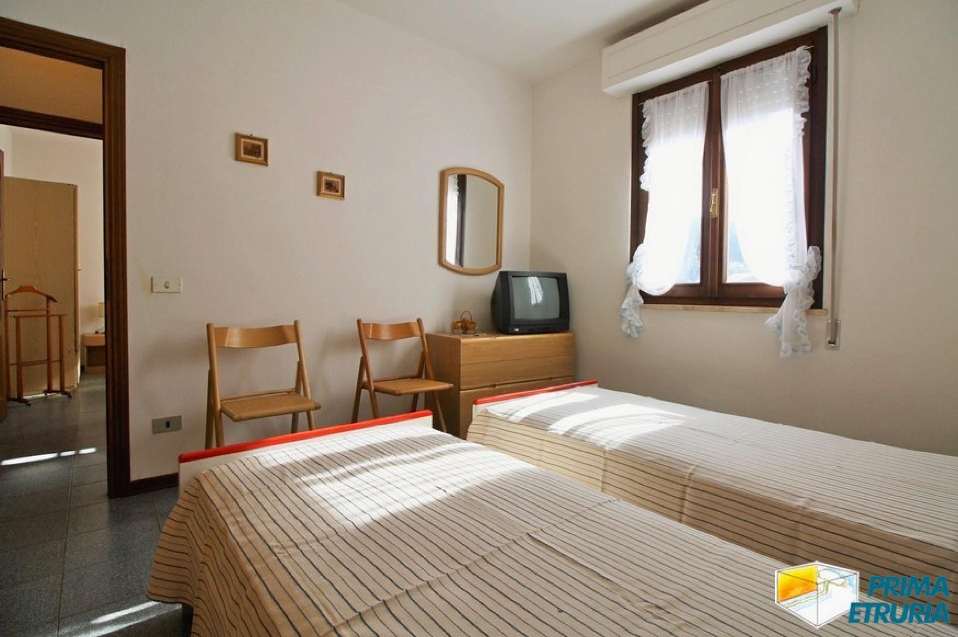 TRILOCALE CON POSTO AUTO- ZONA TOMBOLO -