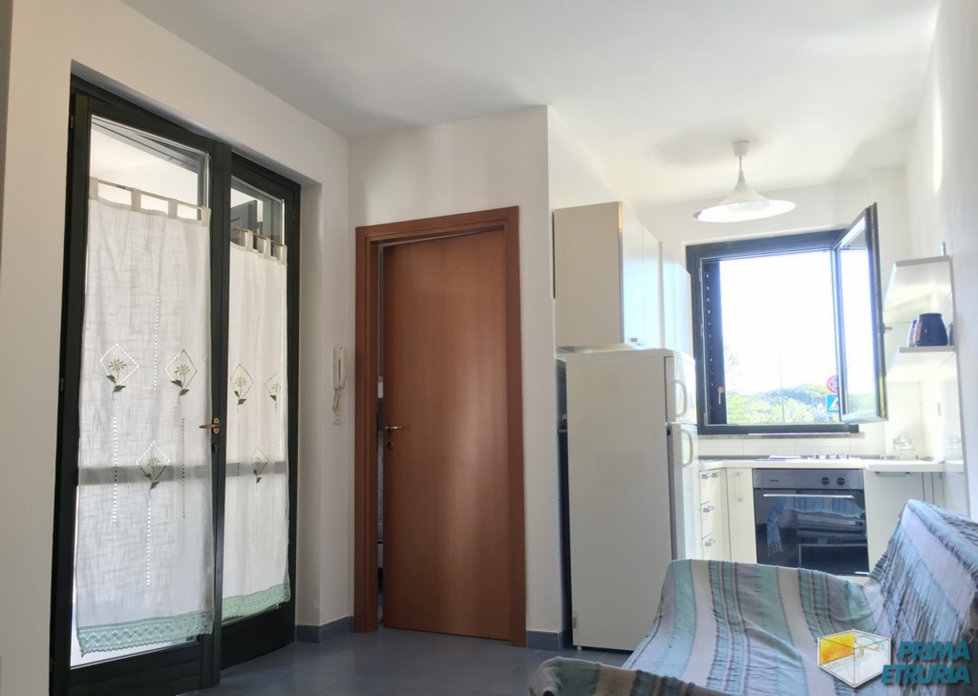 TRILOCALE AL PIANO TERRA CON GIARDINO - ZONA PORTO -