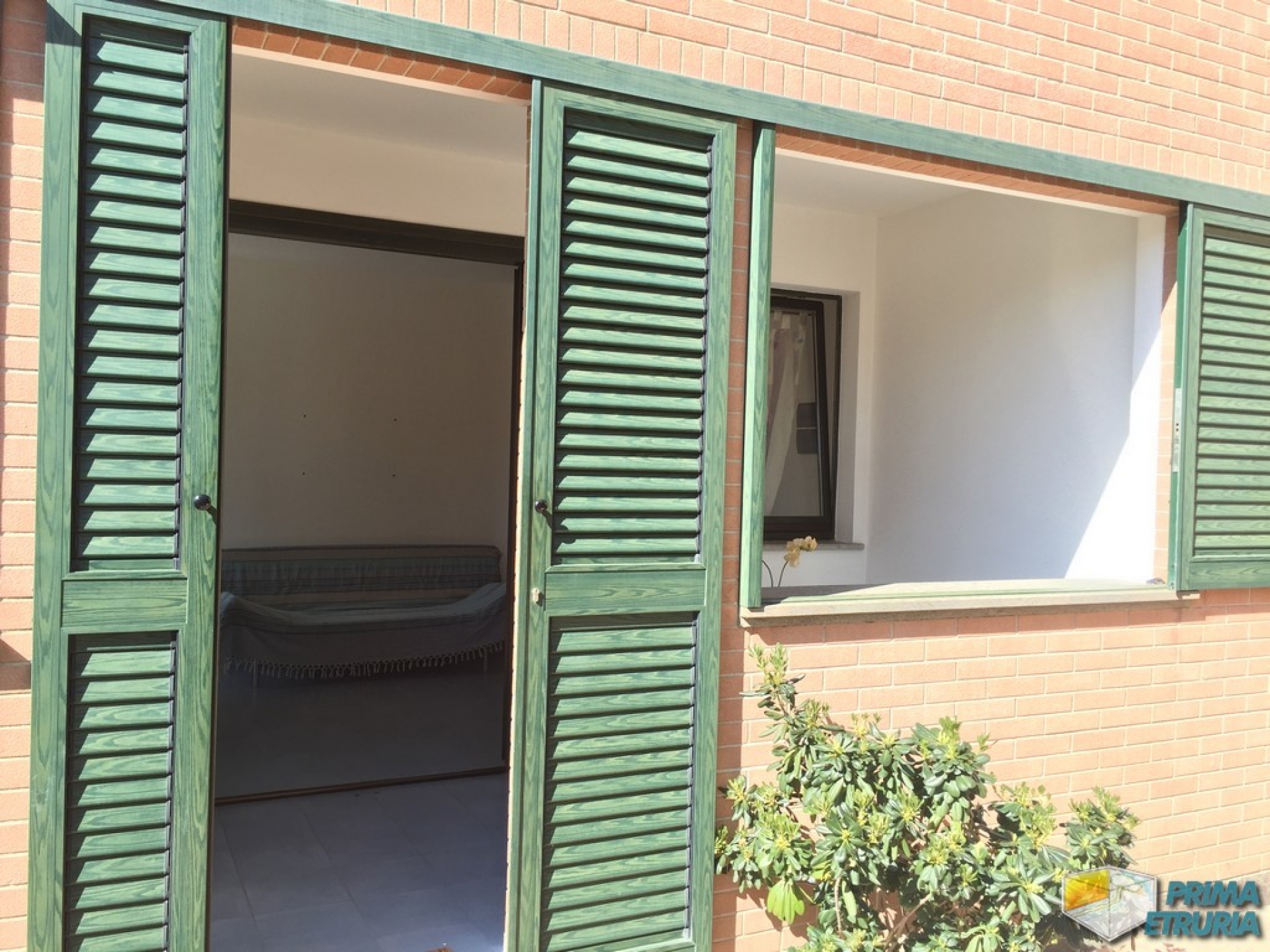 TRILOCALE AL PIANO TERRA CON GIARDINO - ZONA PORTO -